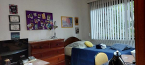 Quarto em casa familiar.